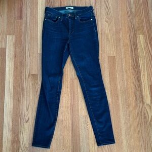 Madewell Medium/ medium dark wash skinny jeans.